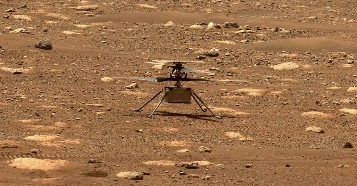 Foto do Ingenuity na superfície de Marte. 