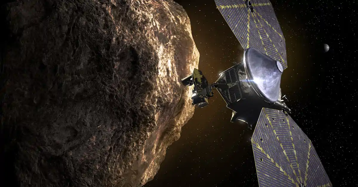 Ilustração artística da sonda Lucy próximo a um asteroide troiano de Júpiter.
