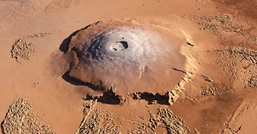 Monte Olimpo, na superfície de Marte, o maior vulcão do Sistema Solar. 