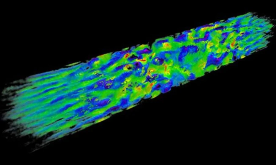 Simulação em computador mostra a estrutura turbulenta do campo magnético em duas ondas de choque se afastando uma da outra.