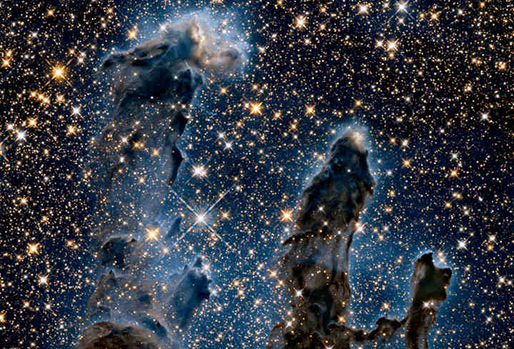 Imagem em infravermelho dos Pilares da Criação na Nebulosa da Águia. Imagem: NASA, ESA e a Equipe do Hubble Heritage (STScI / AURA)