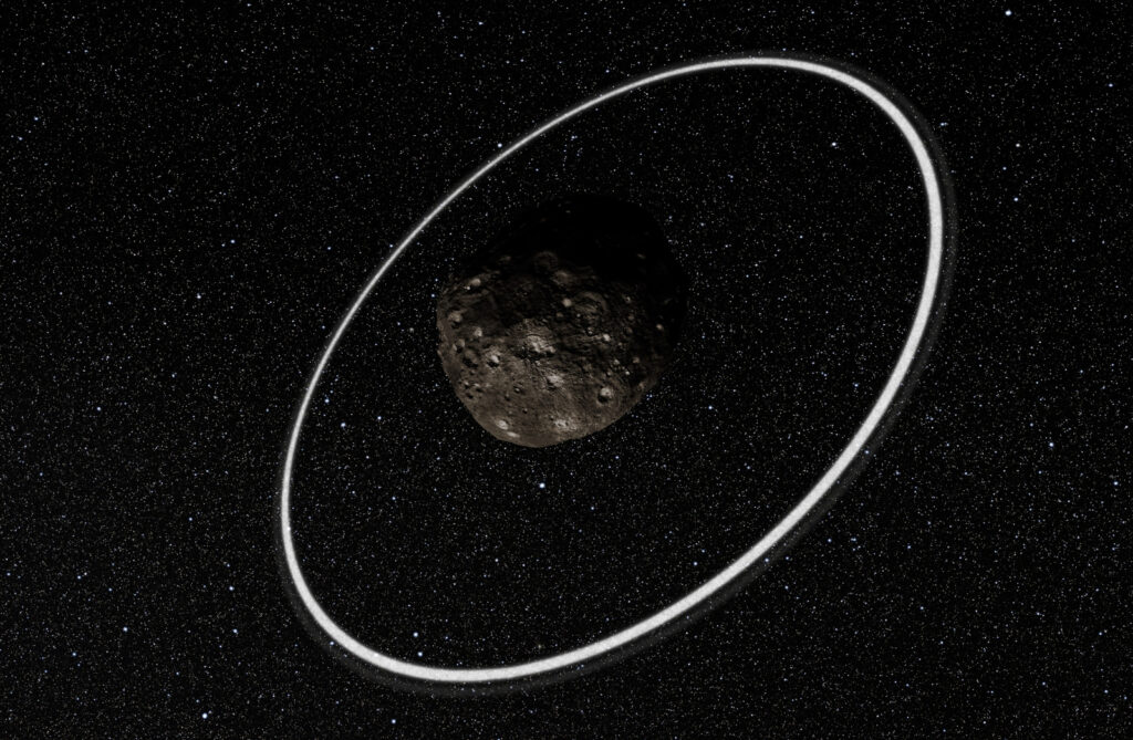 Ilustração artística do asteroide Chariklo, com seu sistema de aneis (Crédito: ESO/L. Calçada/M. Kornmesser/Nick Risinger)